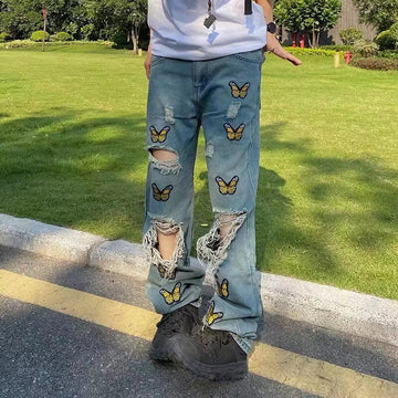 Butterfly Embroidered Torn Jeans For Men